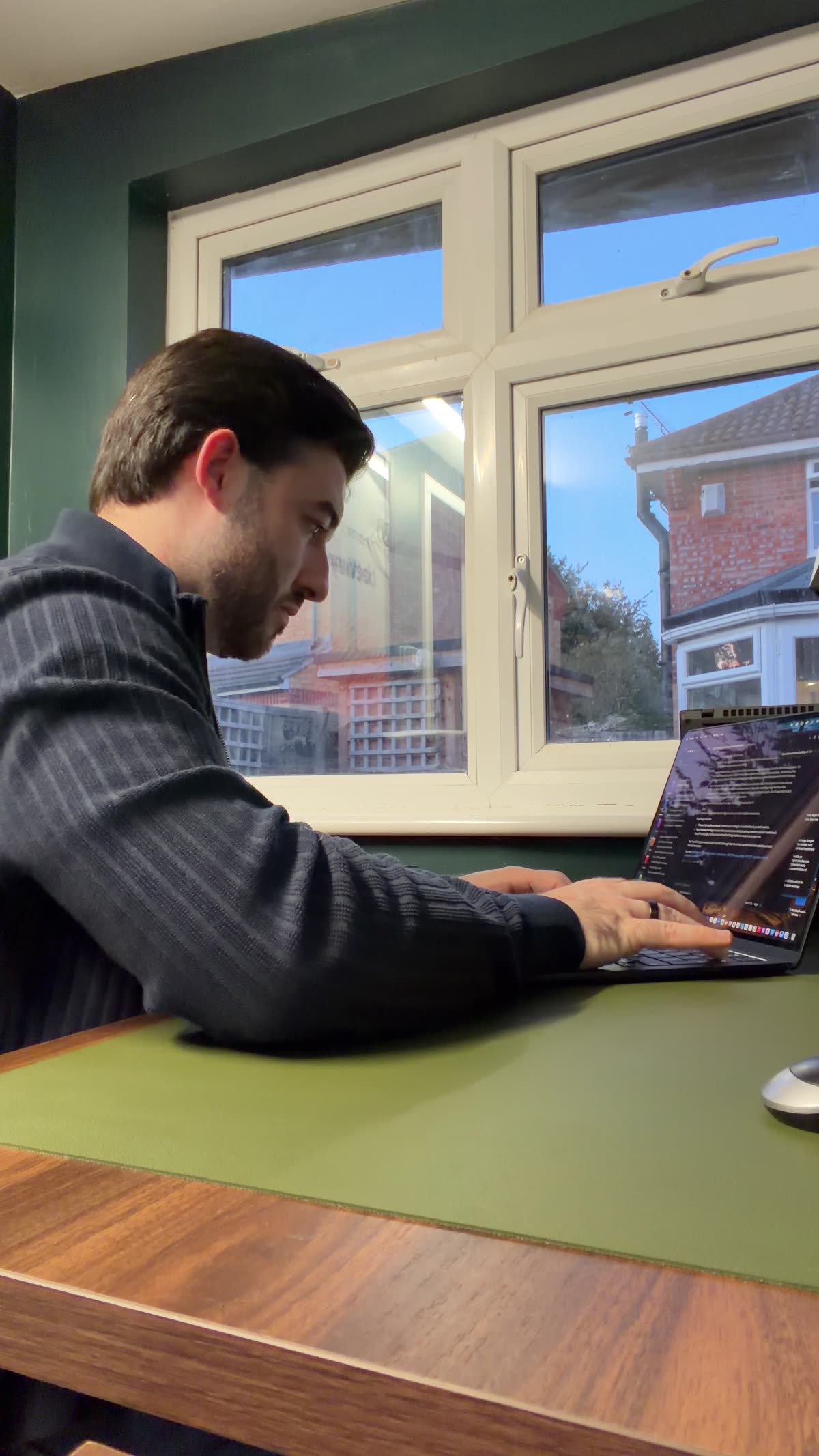 Ollie working at his desk